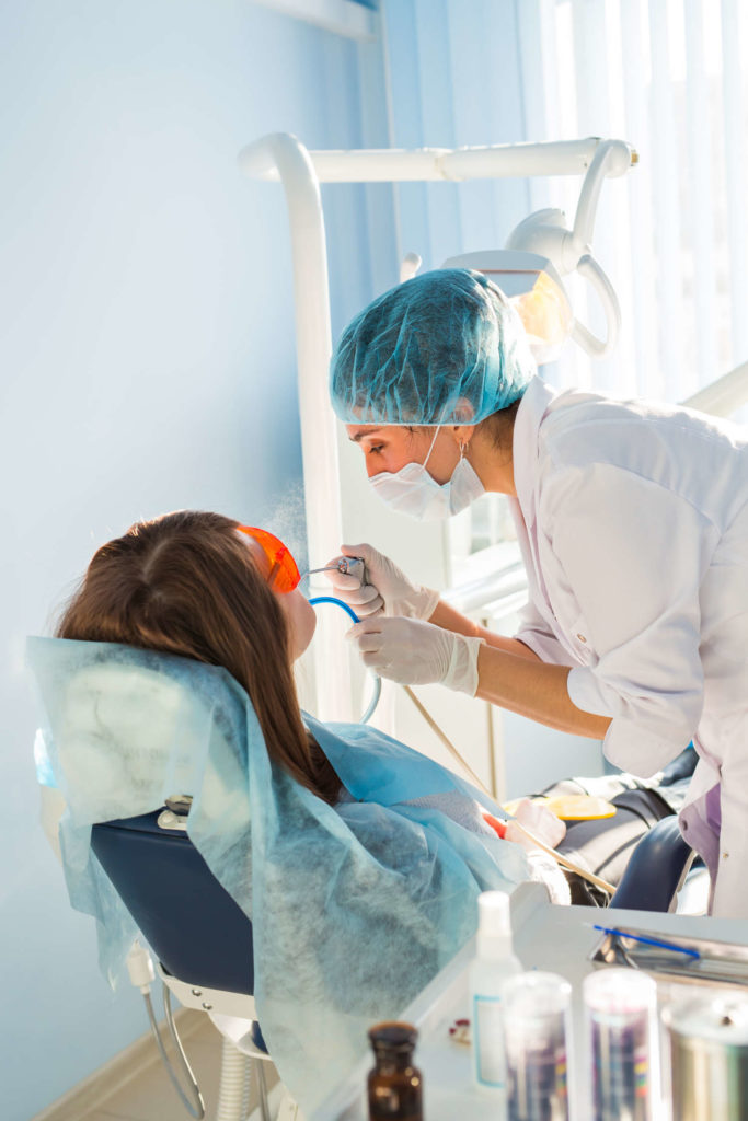 woman at the dentists chair during a dental proced P9XHJPJ